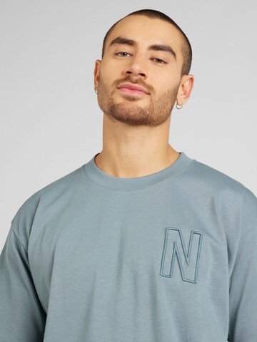 NORSE PROJECTS T-shirt 'Simon' i blå