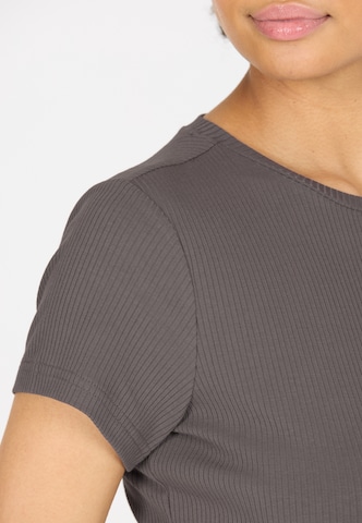 Athlecia Functioneel shirt 'Lankae' in Bruin