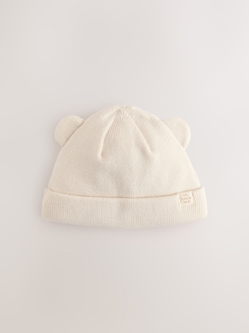 Next Pipo värissä beige