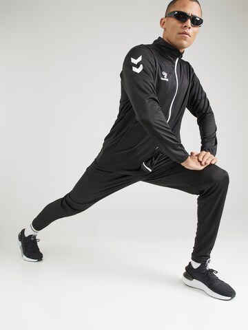 Completo per l'allenamento di Hummel in nero