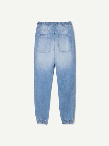 Bershka Tapered Jeans in Blue