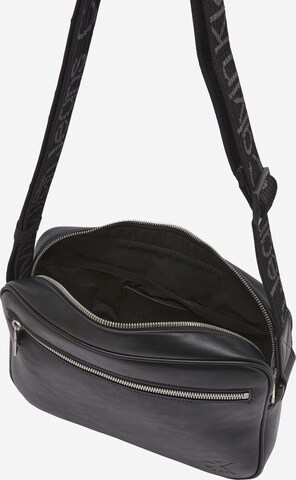 Sac à bandoulière Calvin Klein Jeans en noir