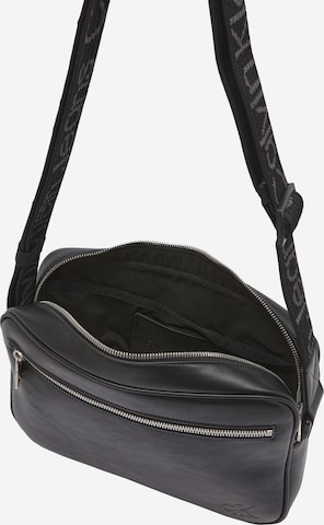 Sac à bandoulière Calvin Klein Jeans en noir