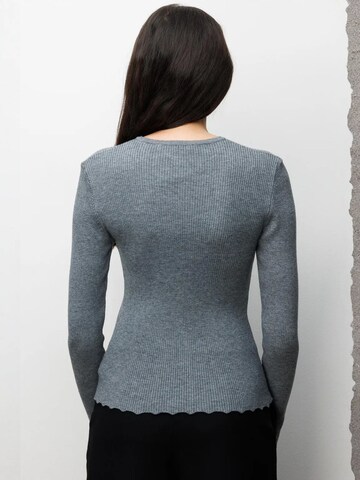 Cardigan MixRay en gris