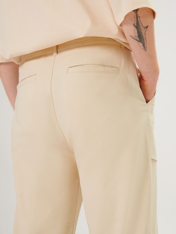 ABOUT YOU x Swalina&Linus Regular Hose 'Leo' in Beige