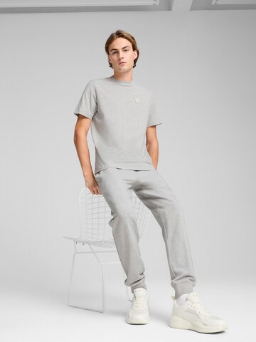 PUMA Bluser & t-shirts 'Essentials' i grå