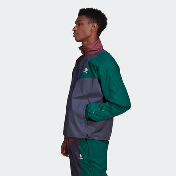 ADIDAS ORIGINALS - Chaqueta de entretiempo 'Adicolor' en Mezcla de colores