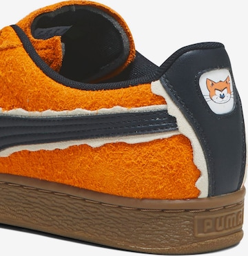 Baskets basses PUMA en orange