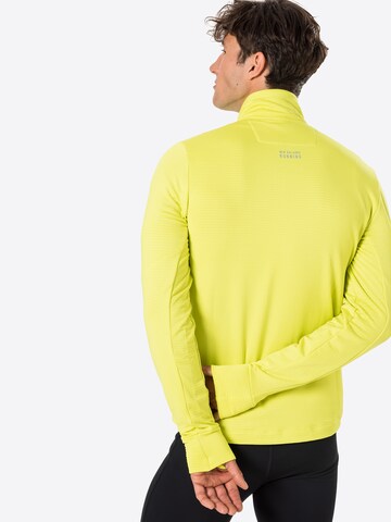 Maglia funzionale 'Impact Run' di new balance in giallo