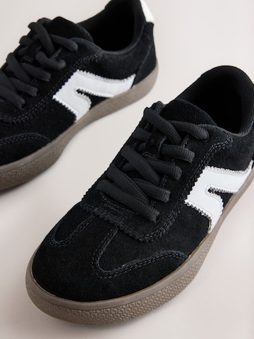 Baskets Next en noir