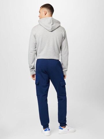 Effilé Pantalon cargo 'Trefoil Essentials ' ADIDAS ORIGINALS en bleu