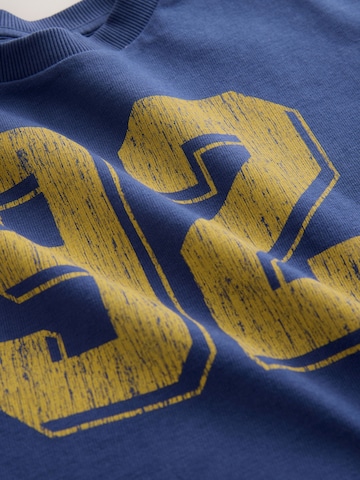 T-Shirt Next en bleu