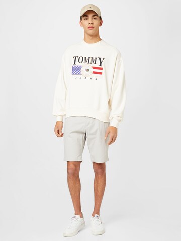 TOMMY HILFIGER Regular Chinohousut 'HARLEM' värissä harmaa