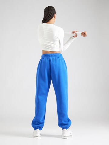 Nike Sportswear Loosefit Kalhoty 'Phoenix Fleece' – modrá