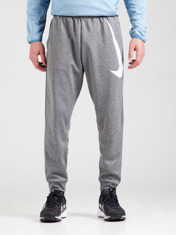 Tapered Pantaloni sport de la NIKE pe gri: față