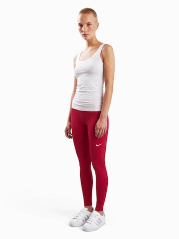 NIKESkinny Sportske hlače 'NP 365' - crvena boja
