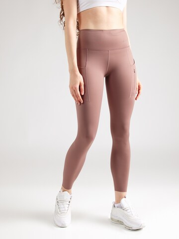 Skinny Pantaloni sport de la NIKE pe maro: față