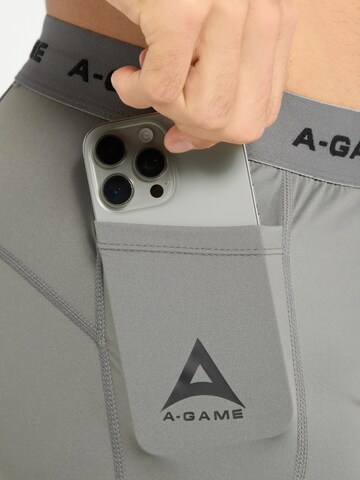 regular Pantaloni sportivi di A-Game in grigio