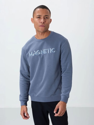 Sweat-shirt Tommy Life en bleu : devant