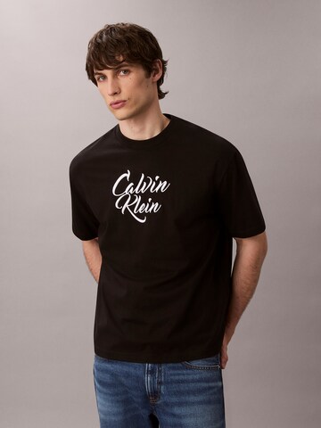 Calvin Klein Jeans T-shirt i svart: framsida