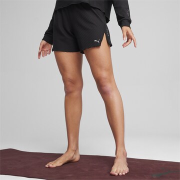 PUMA Regular Workout Pants 'Premium Studio' in Black: front