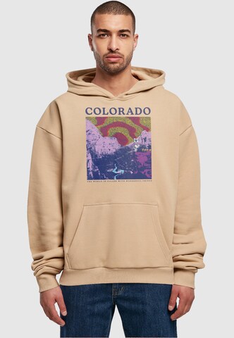 Merchcode Sweatshirt 'Peanuts - Colorado' in Beige: front
