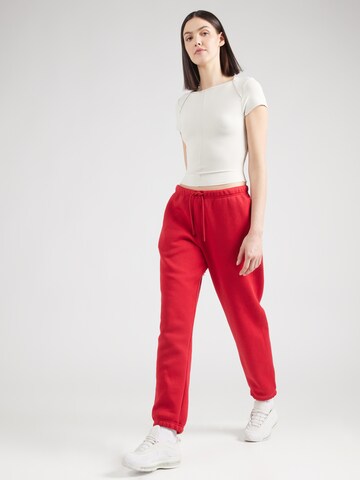Tapered Pantaloni 'BRKLN FLC' di Jordan in rosso