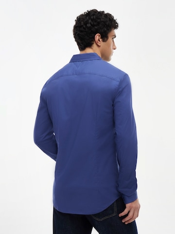 Coupe slim Chemise Tommy Jeans en bleu