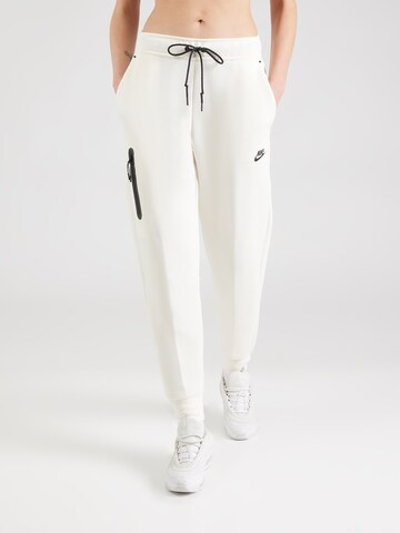 Nike Sportswear Tapered Trousers 'TCH FLC' in White: front