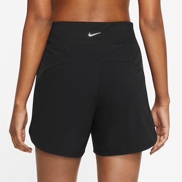NIKE Regular Workout Pants 'BLISS' in Black