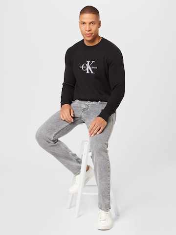 Calvin Klein Jeans Pullover 'DRIVER' in Schwarz