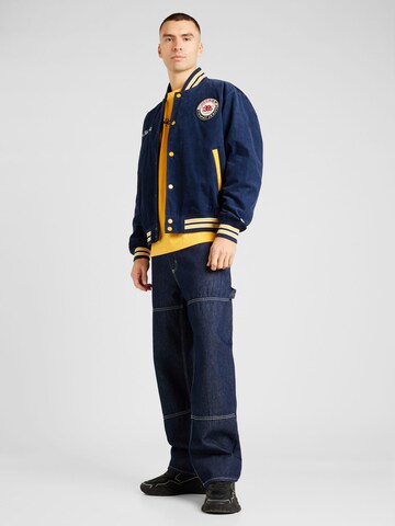 Tommy Jeans Φθινοπωρινό και ανοιξιάτικο μπουφάν 'ARCHIVE GAMES VARSITY' σε μπλε