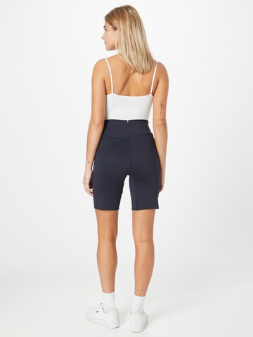 TOMMY HILFIGER Skinny Kalhoty – modrá