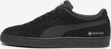 Baskets basses PUMA en noir