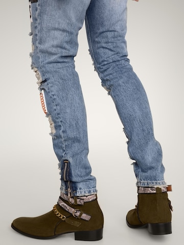 Boots 'SNAKE BUCKLE' MAD TIGERS en vert
