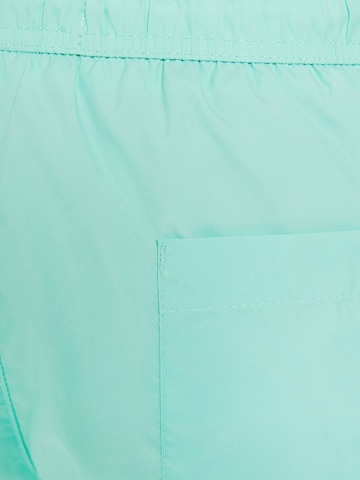 Bershka Plavecké šortky – modrá