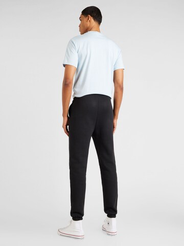 Regular Pantalon de sport Reebok en noir