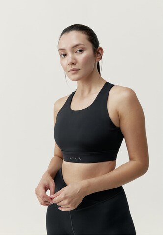 Born Living Yoga Sports Top 'Nara' in Black: front
