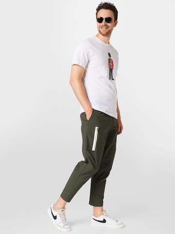 Nike Sportswear Alt kitsenev Klapptaskutega püksid, värv roheline