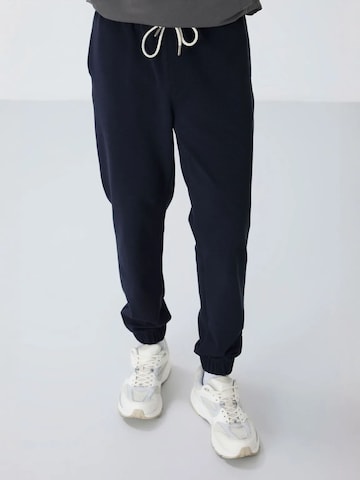 Tommy Life Broek in Blauw: voorkant
