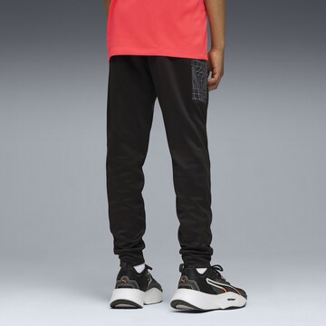 PUMA Tapered Sports trousers 'Train All Day Essentials' in Black