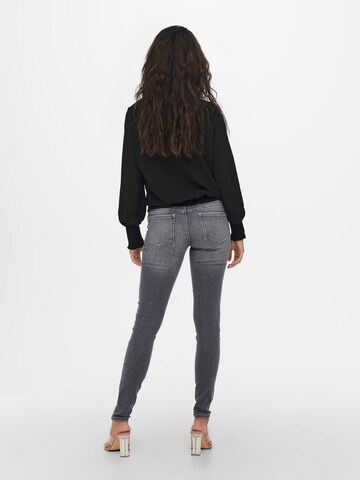Skinny Jeans 'Coral' di ONLY in grigio