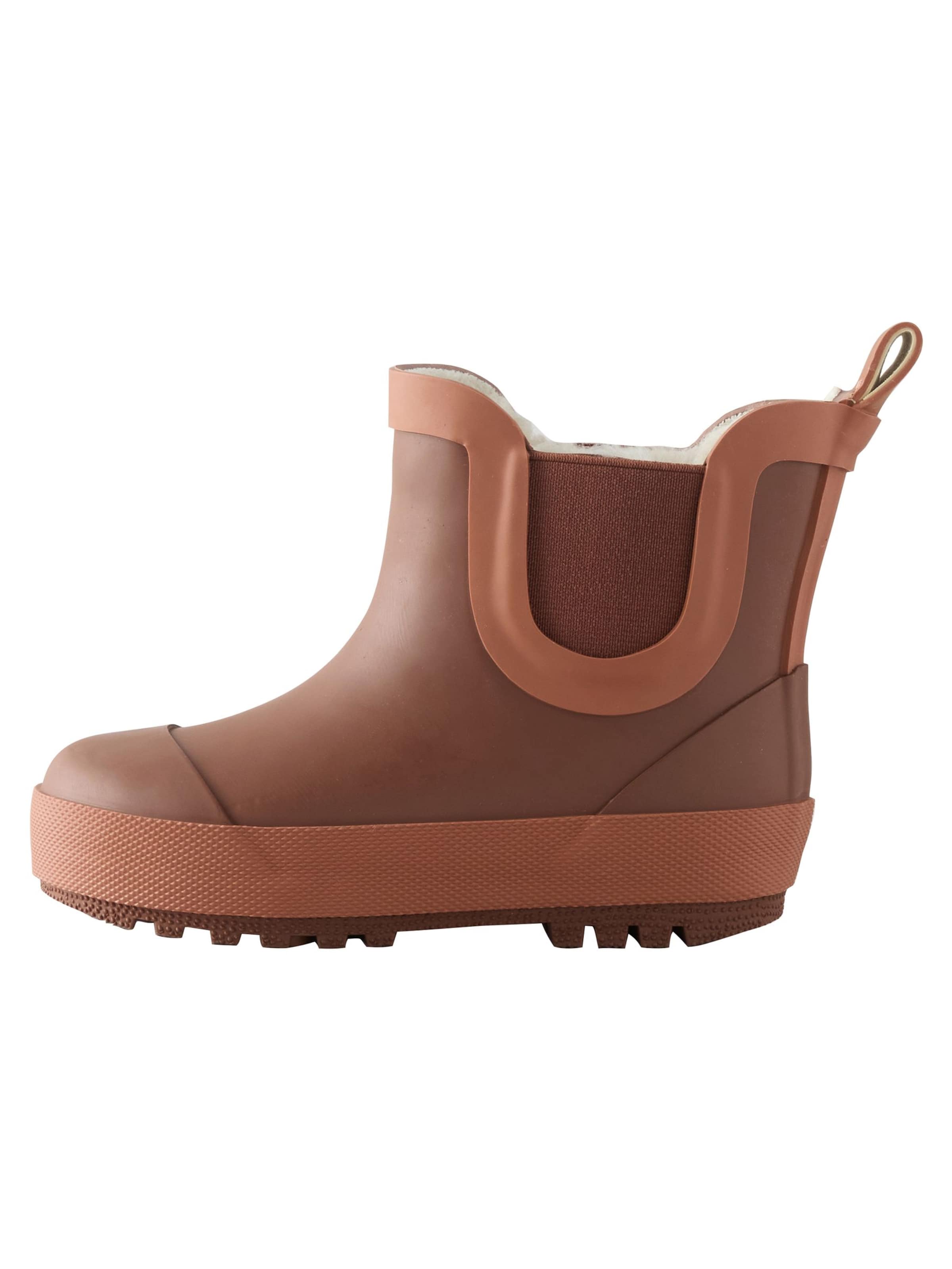 Cizme de cauciuc de la Next pe maro: față