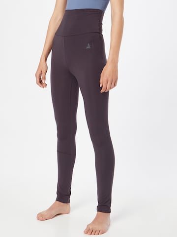 Skinny Pantaloni sportivi di CURARE Yogawear in lilla: frontale