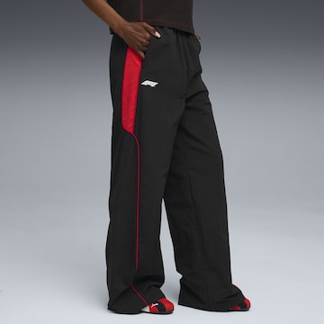 PUMA Wide leg Pants 'F1' in Black: front
