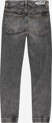 Calvin Klein Jeans Tapered Jeans in Grijs