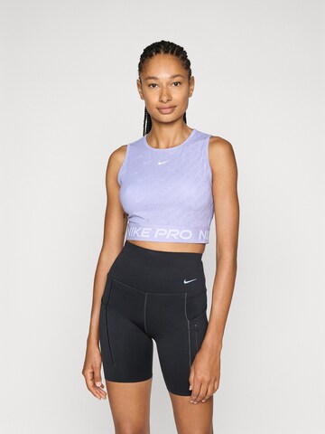 NIKE Спортивный топ в Лиловый: спереди