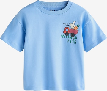 zils Next T-Krekls: no priekšpuses