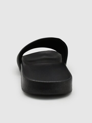 Claquettes / Tongs 'Corbin' Smilodox en noir