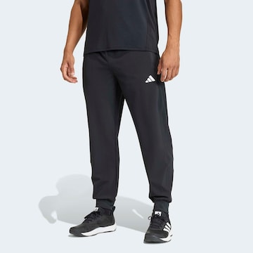 ADIDAS PERFORMANCE Tapered Workout Pants in Black: front